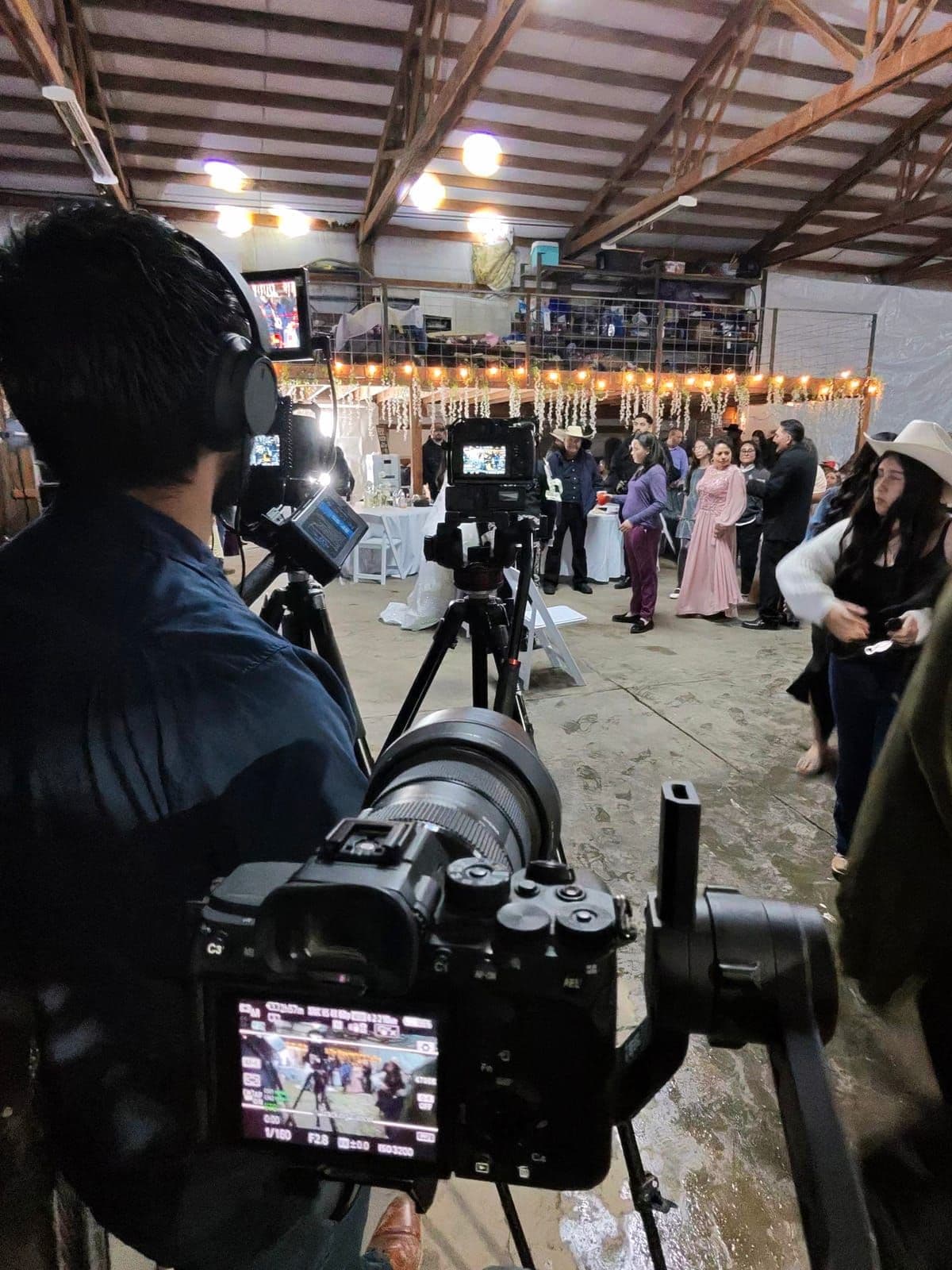 Behind the scenes of New Diamond Productions filming at an event in Yakima